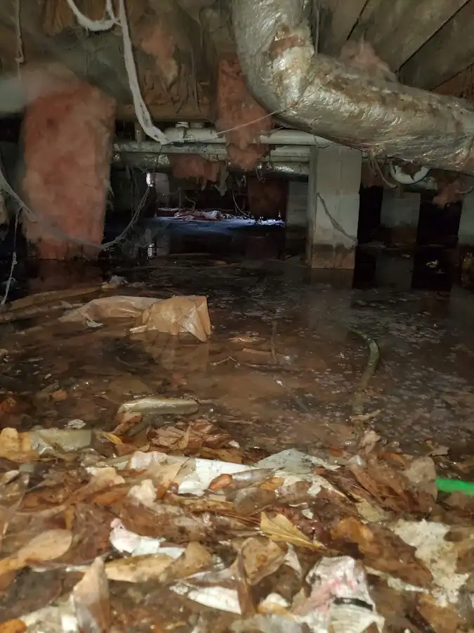 Crawl space flood assessment for Commercial Water Damage Restoration in Beachwood
