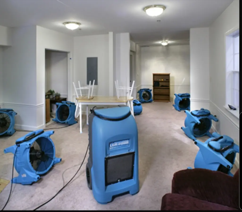 Air movers and dehumidifier setup for Water Damage Restoration in Beachwood